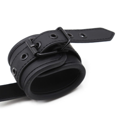 Handcuffs with handle for control and dominance