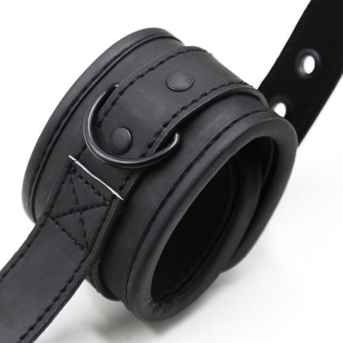 Handcuffs with handle for control and dominance